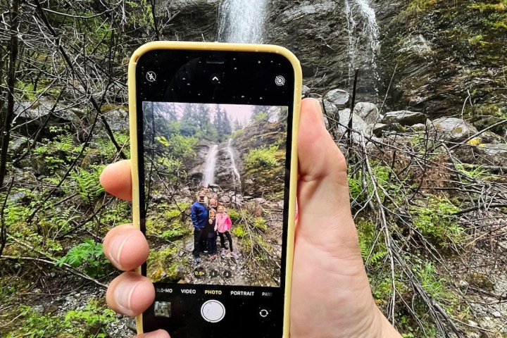 a hand holding a cellphone