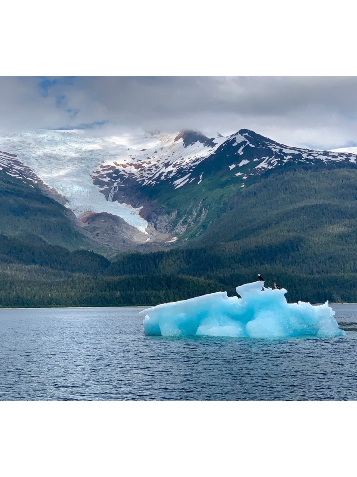 a lake with a mountain in the background