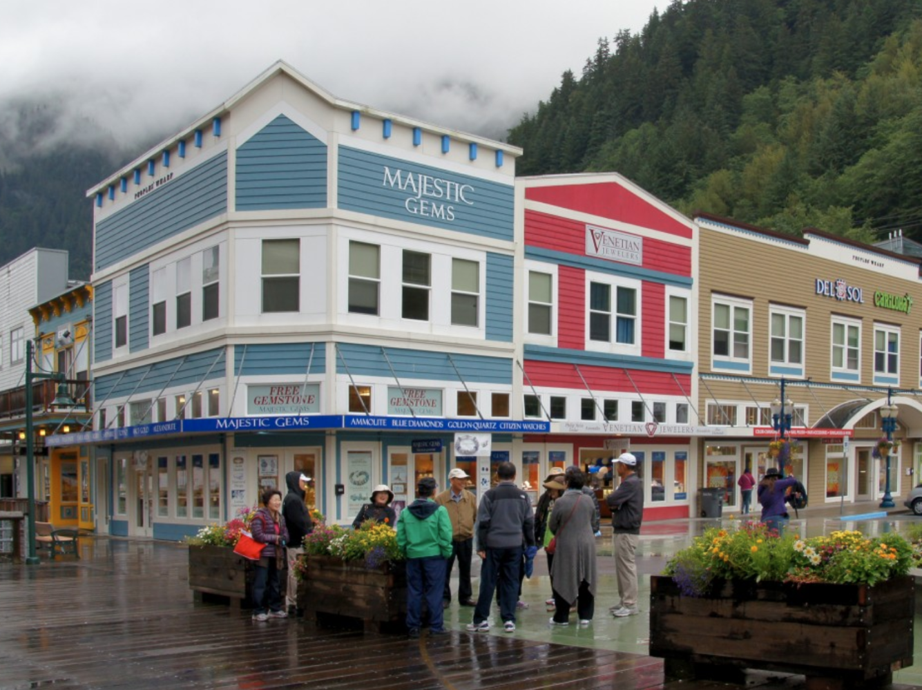 a group of people standing in front of a building